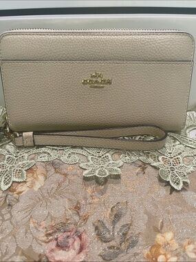Coach Pebbled Leather Wristlet in Taupe with Gold Hardware
